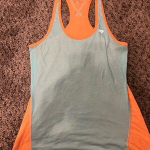 Marika Two-Tone Tank Top in Orange and light blue. Dry-Wik Performance Tee